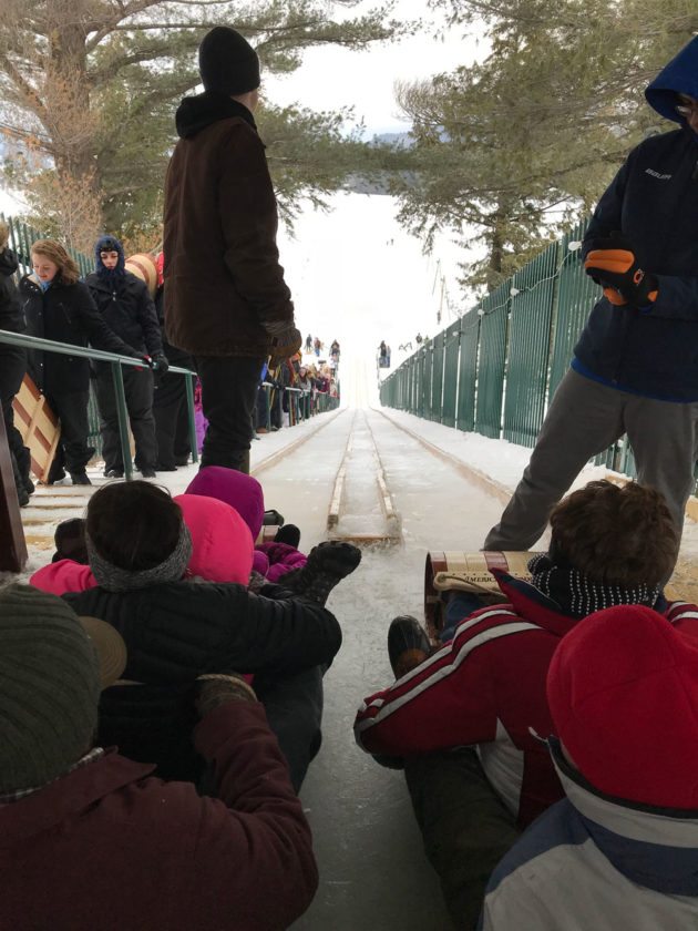 Whooshing onto Mirror Lake from the new toboggan chute News, Sports, Jobs Adirondack Daily